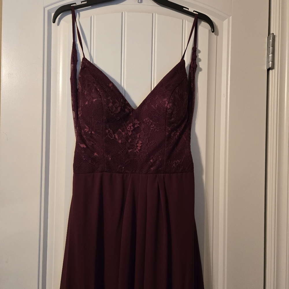 Prom or brides maid dress size 6. Worn once has slit. In excellent conditio.